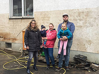 Family Deißler in front of their house in Ahrtal