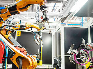 Robot welding solution for water heaters