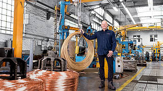 Maintenance Manager Kai-Uwe Buyna stands in the production hall of Lebronze Alloys